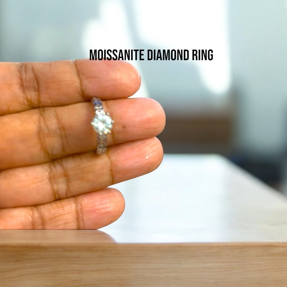 259. Moissanite Three-Stone Ring with Sparkling Stones